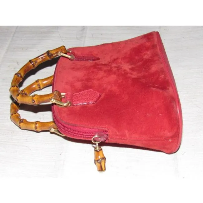 Gucci red suede & leather two-way style, purse with a detachable strap, bamboo handles, and gold equestrian accents!
