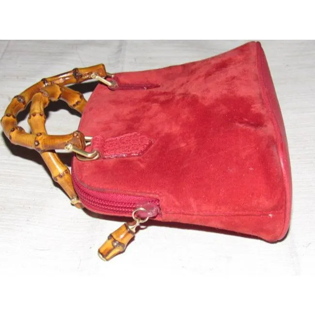 Gucci red suede & leather two-way style, purse with a detachable strap, bamboo handles, and gold equestrian accents!