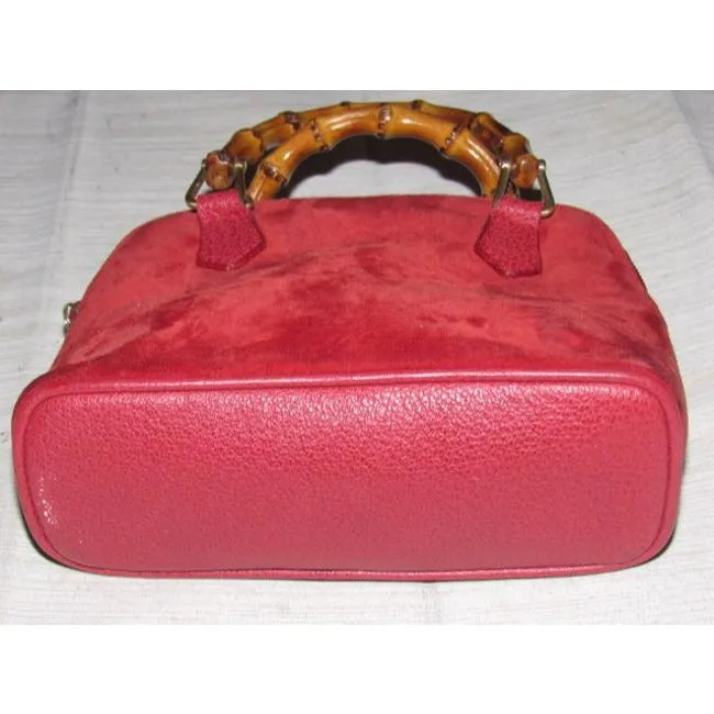Gucci red suede & leather two-way style, purse with a detachable strap, bamboo handles, and gold equestrian accents!