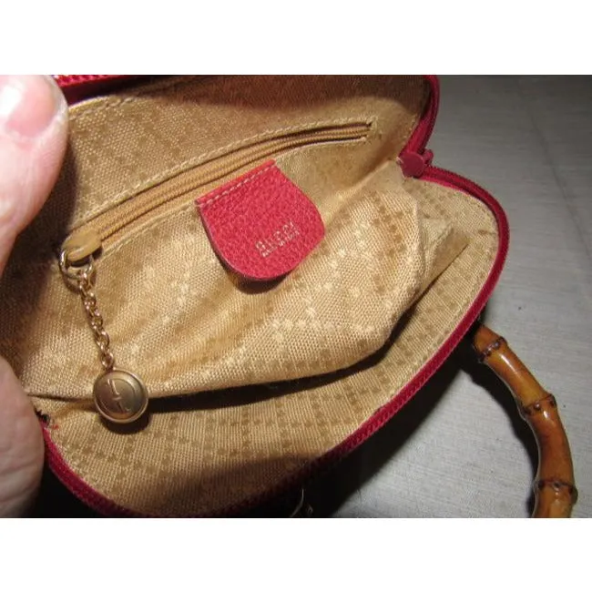 Gucci red suede & leather two-way style, purse with a detachable strap, bamboo handles, and gold equestrian accents!