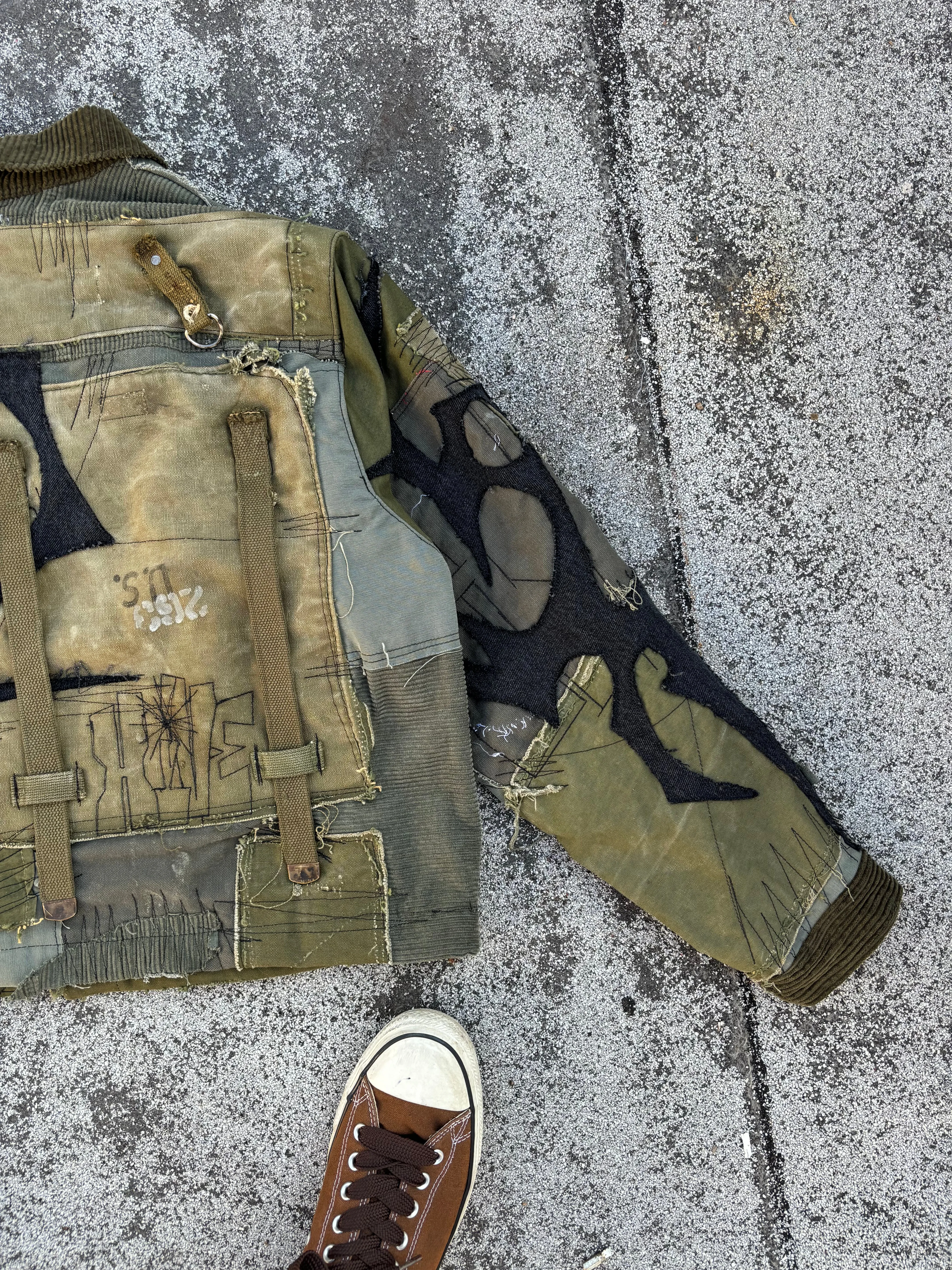HIVE.MENTALITY Tribal patchwork military jacket