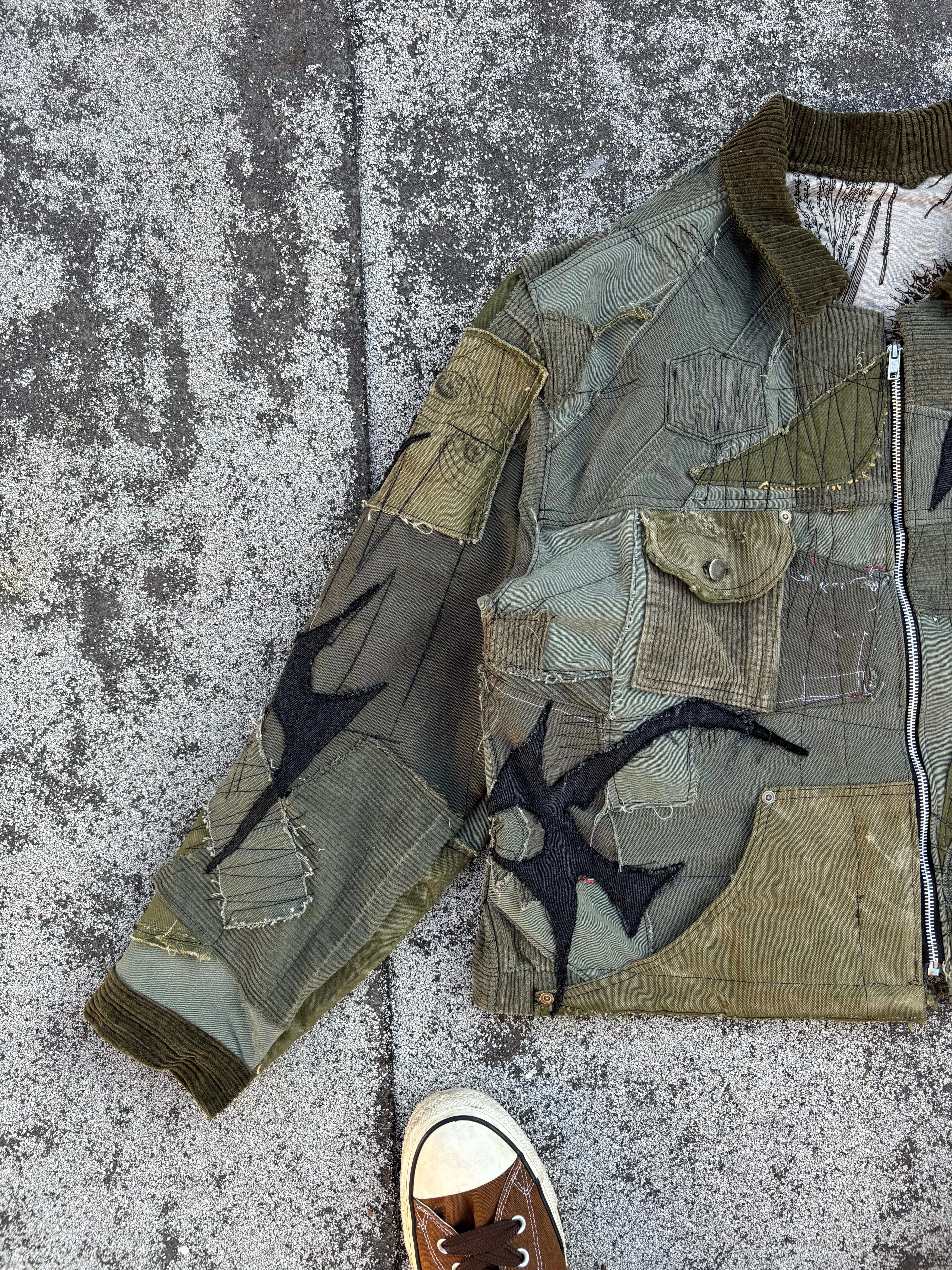 HIVE.MENTALITY Tribal patchwork military jacket