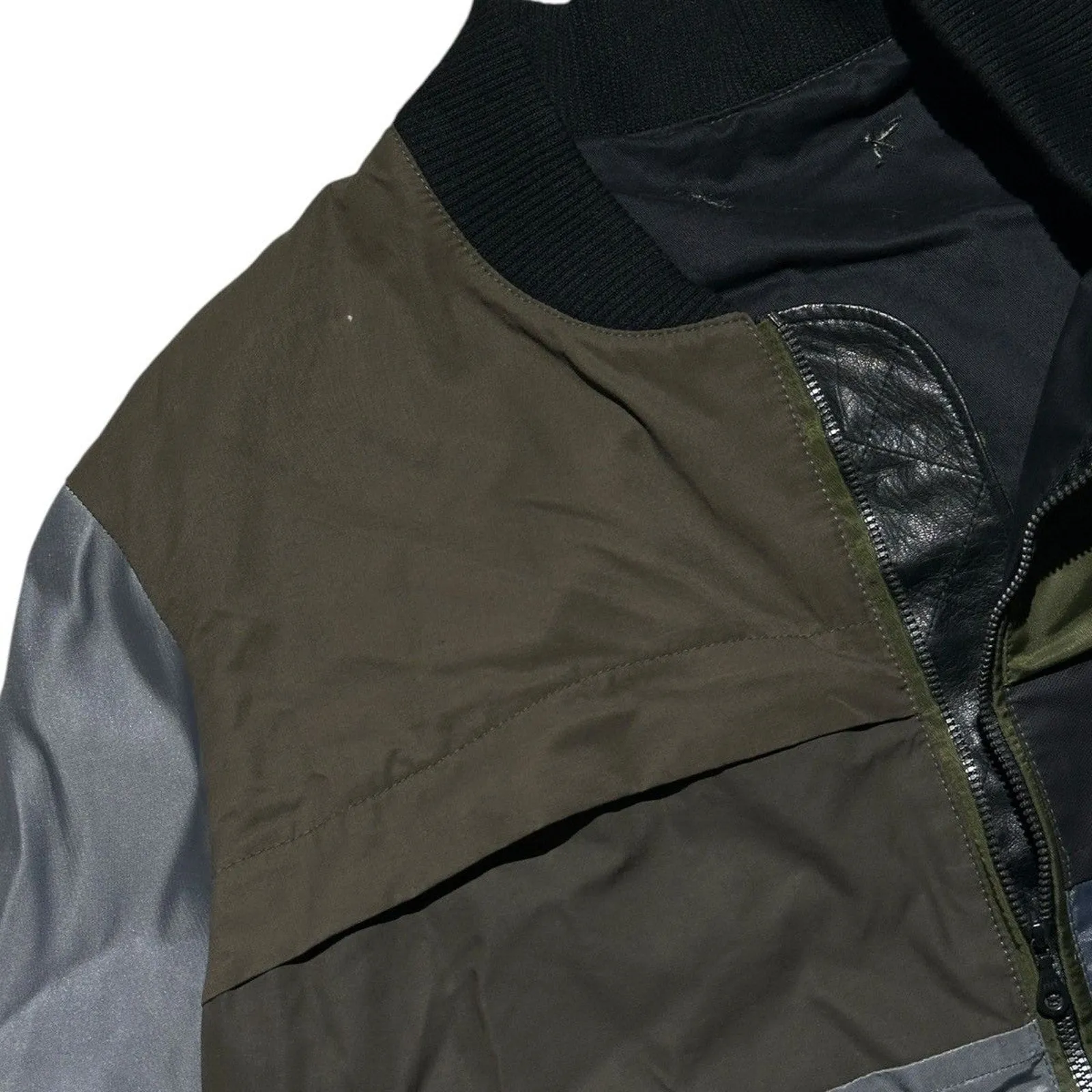 Reconstructed patchwork backpack bomber